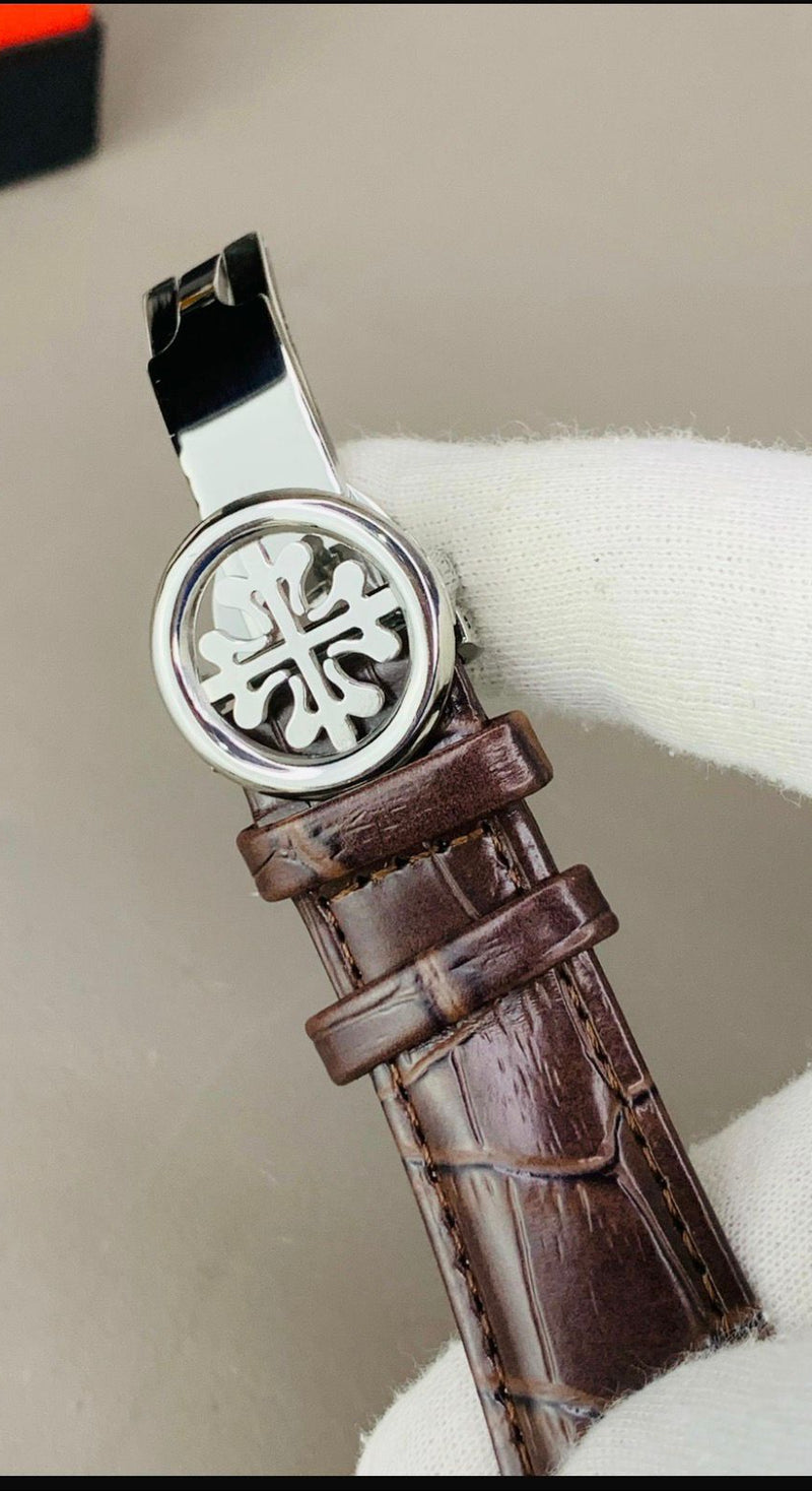 Patek Philippe Leather Strap Watch – Classic Stainless Steel Dial